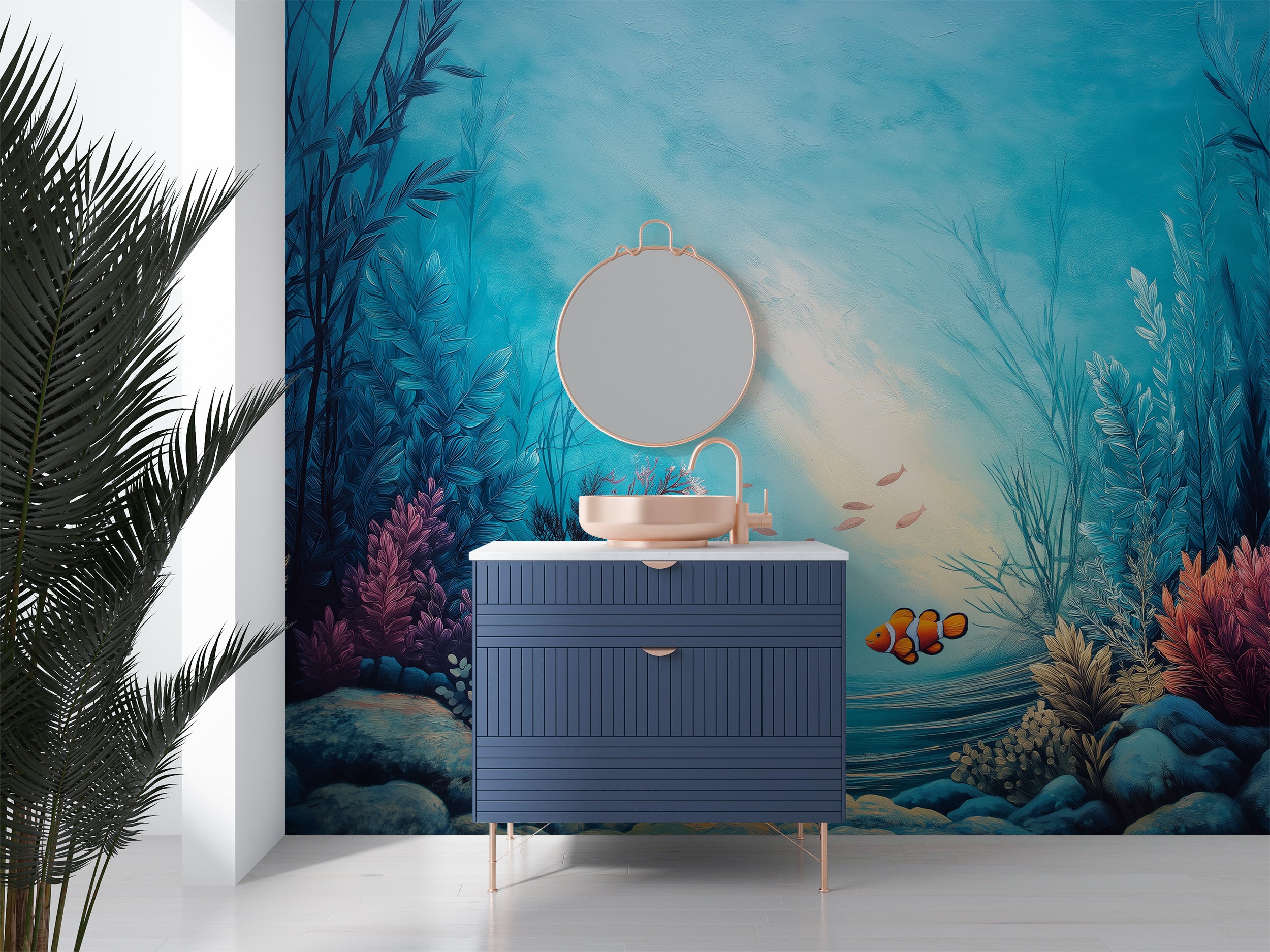 Underwater coral reef mural in a turquoise blue bathroom setting with a blue vanity, round mirror, and tropical sea life acce
