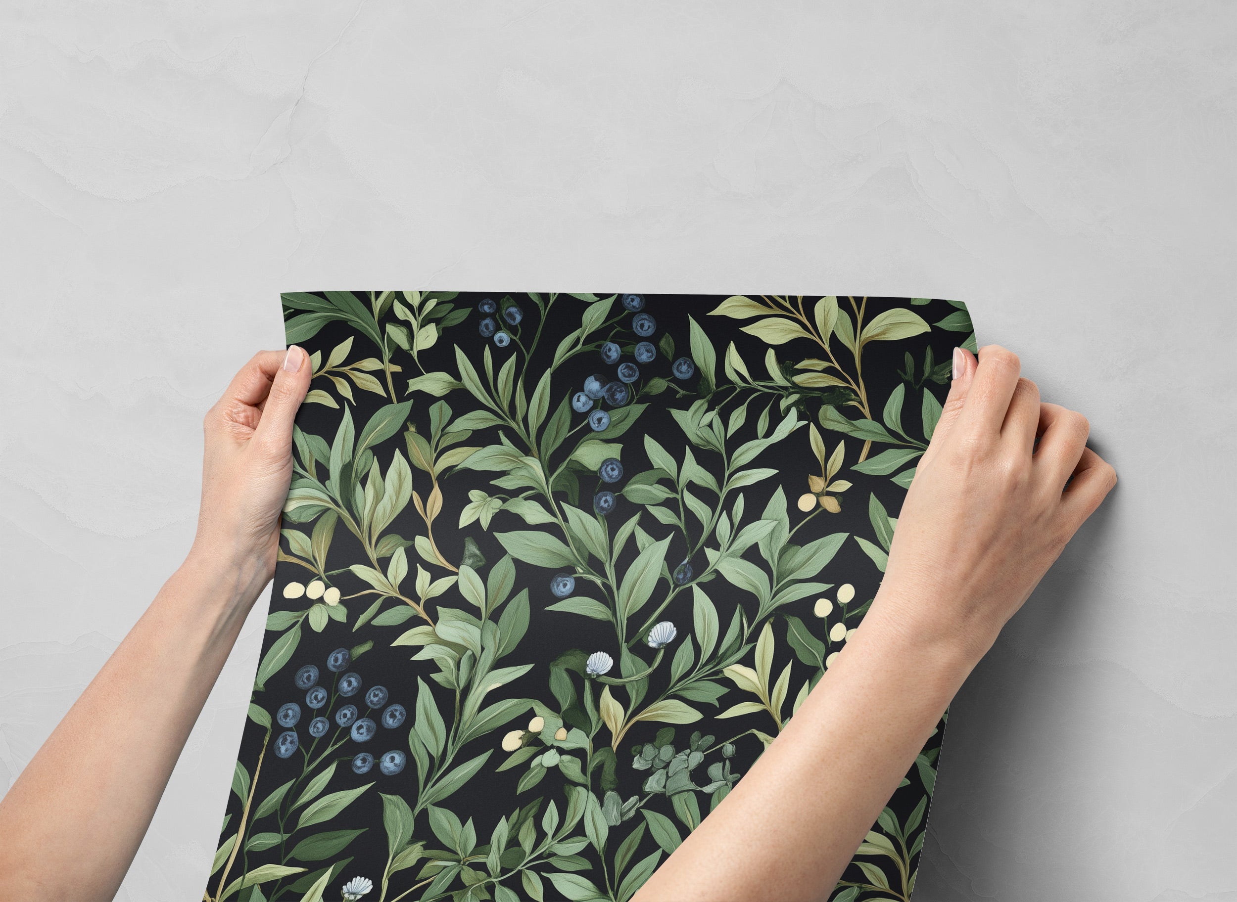 Hand-painted botanical wallpaper with blueberry clusters and green leaves on a black background for peel and stick decor