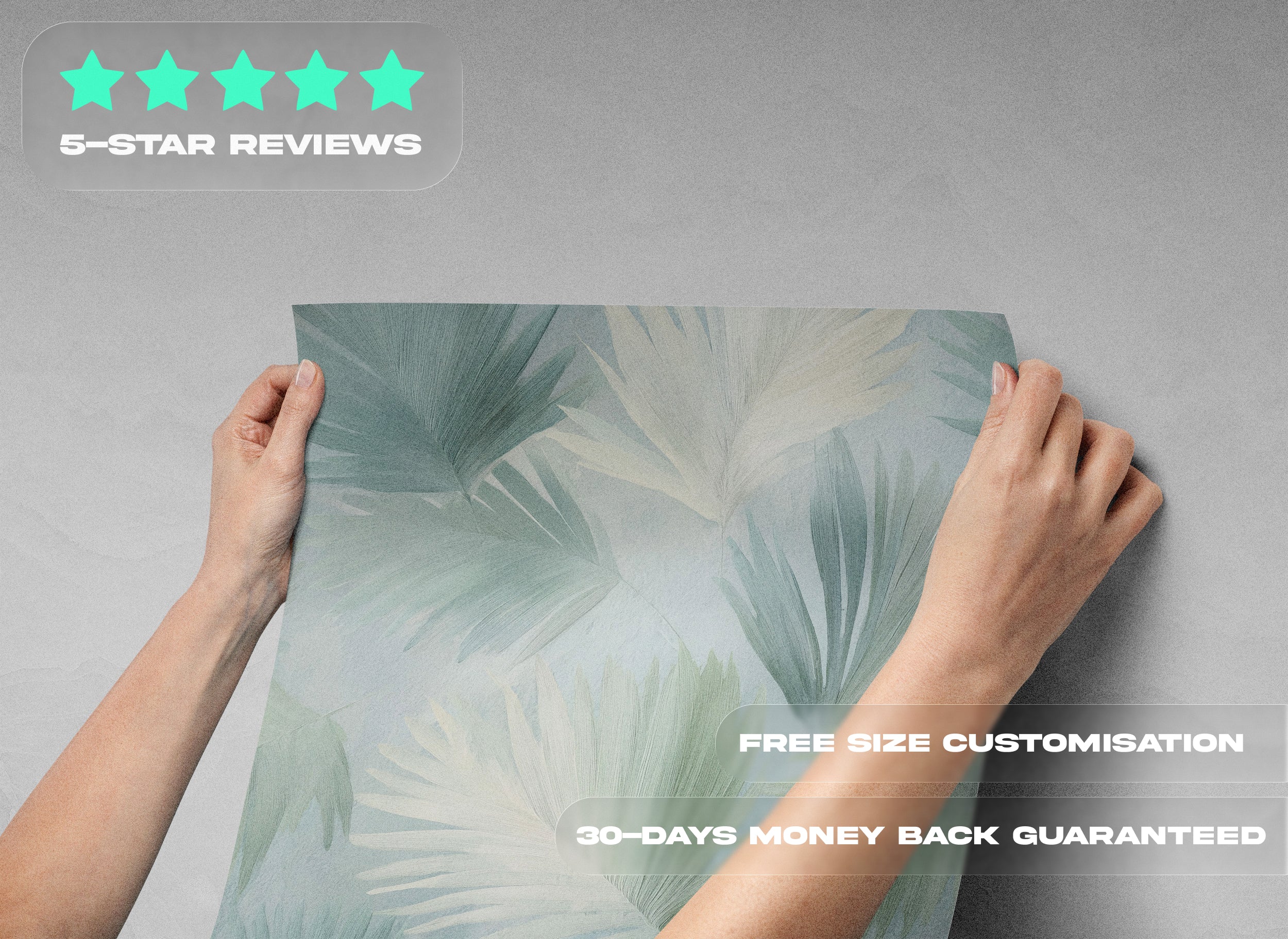 A person holds a tropical palm leaves wallpaper panel in sage green and cream tones, showing a seamless palm pattern for wall