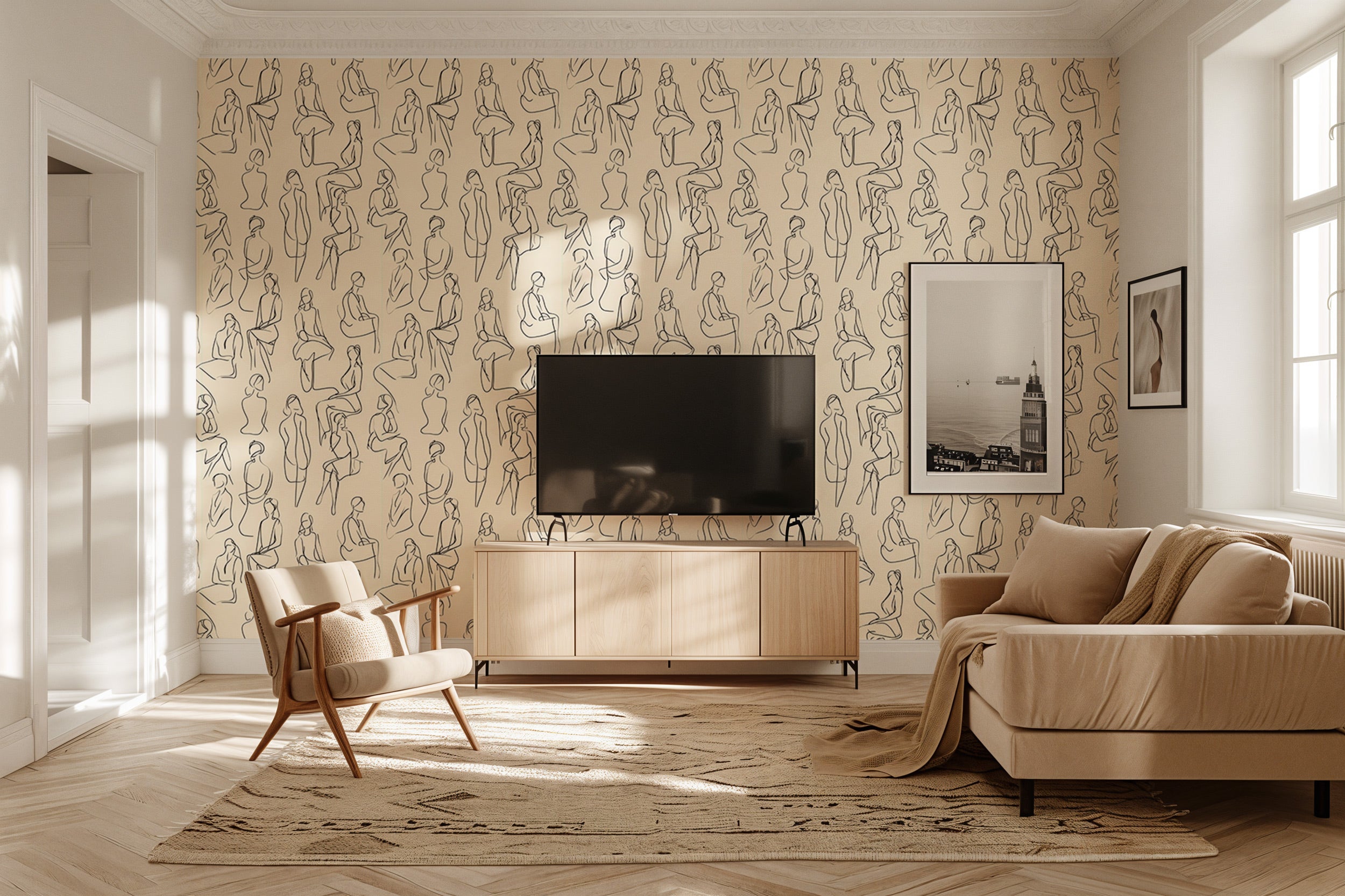 Beige wallpaper with minimalist black line figures in a repeating abstract human form, in a modern living room with a TV cons