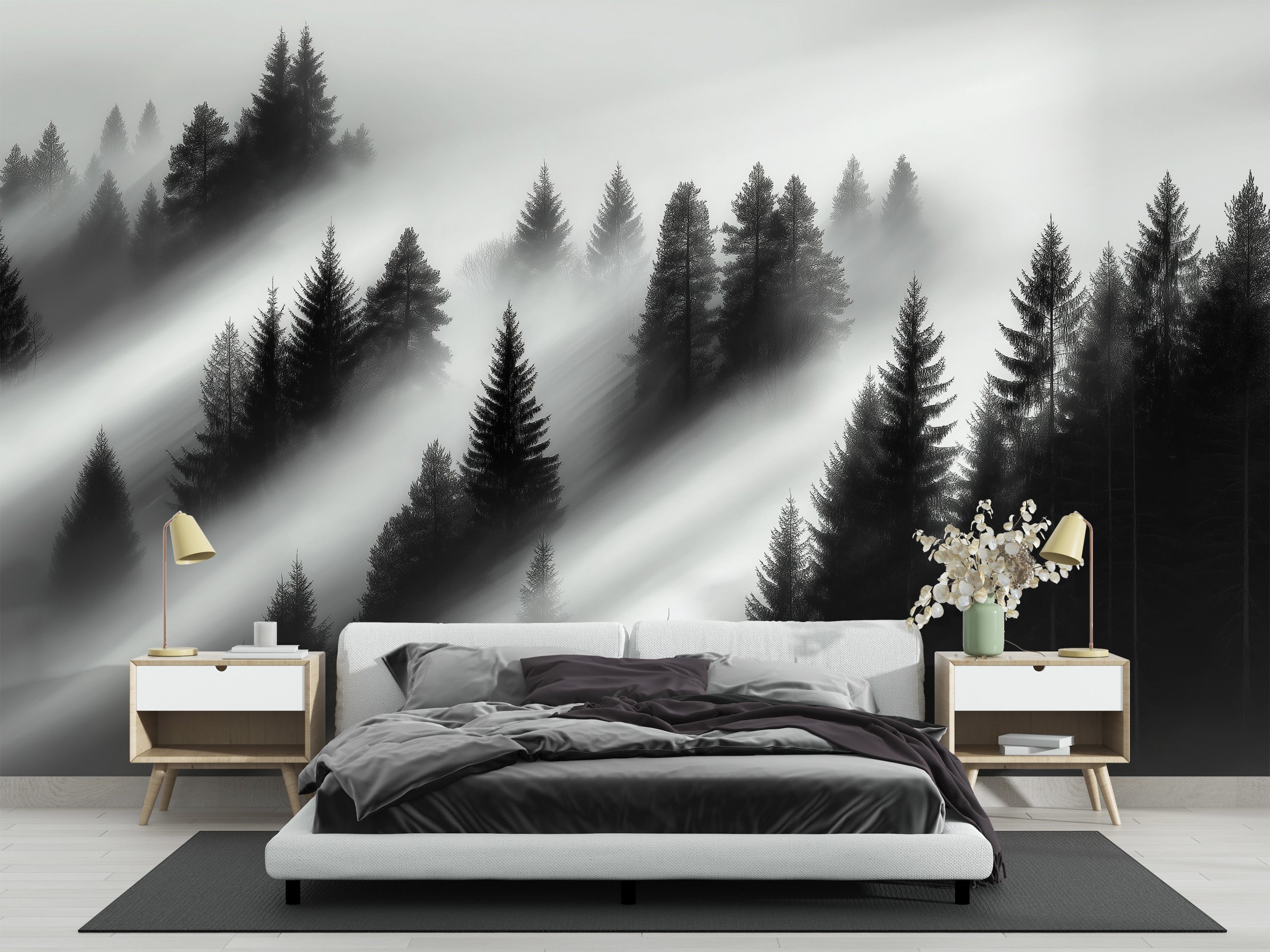 Misty forest mural in black and white with fog and evergreen trees, bedroom with modern bed and side tables featuring warm la