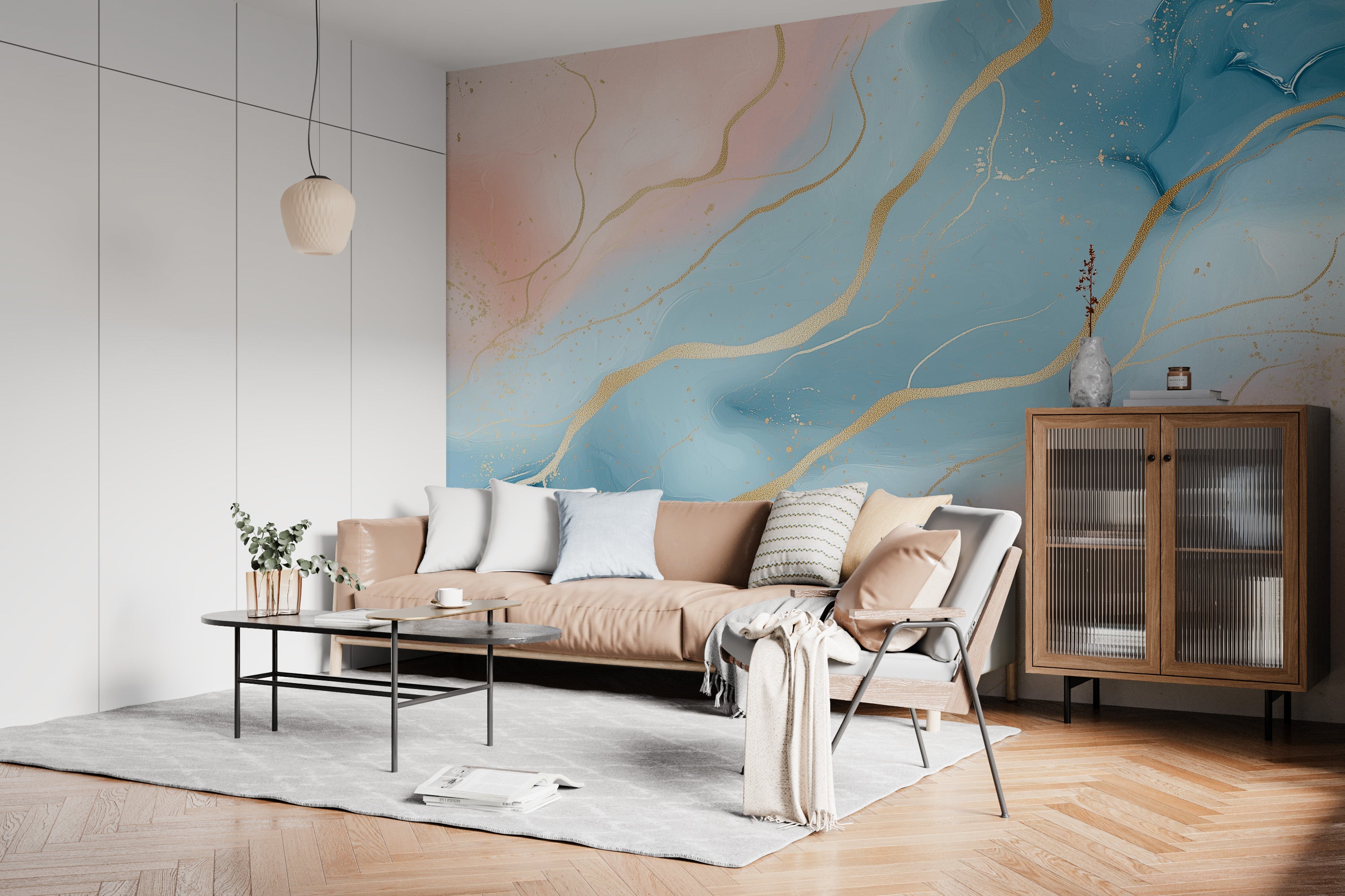 Blue pink abstract mural with gold veining on living room wall behind peach sofa and modern furniture, watercolor-inspired se