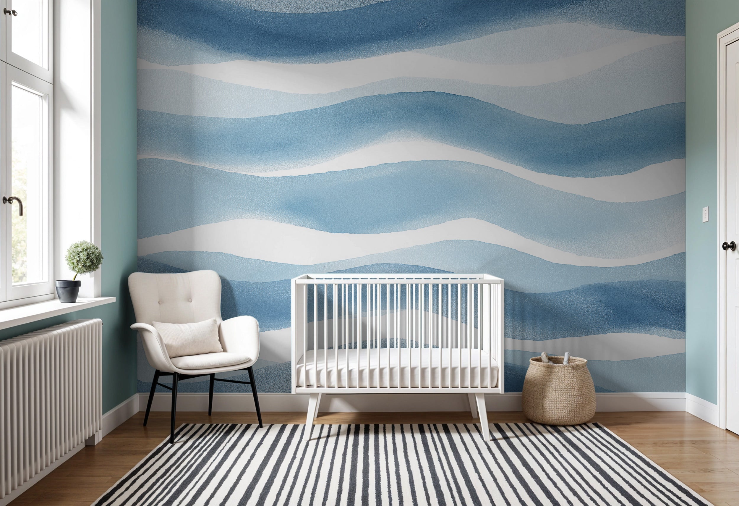 Blue abstract wave mural in a nursery setting with a white crib, light chair, striped rug, and soft blue walls featuring flow