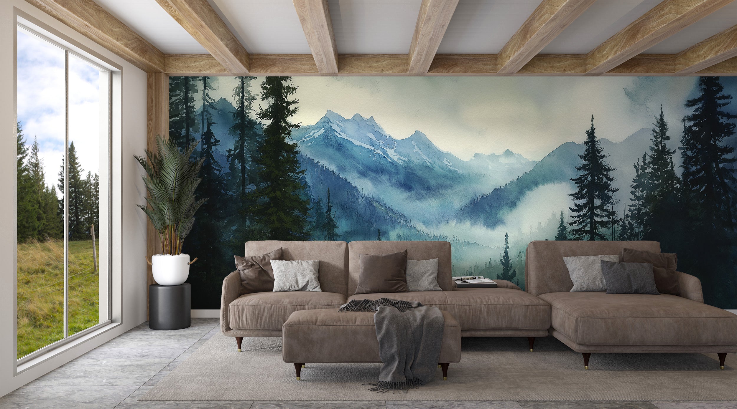 Watercolour mountain forest mural in a living room with a brown sectional, misty blue peaks, evergreen trees, and a calm natu