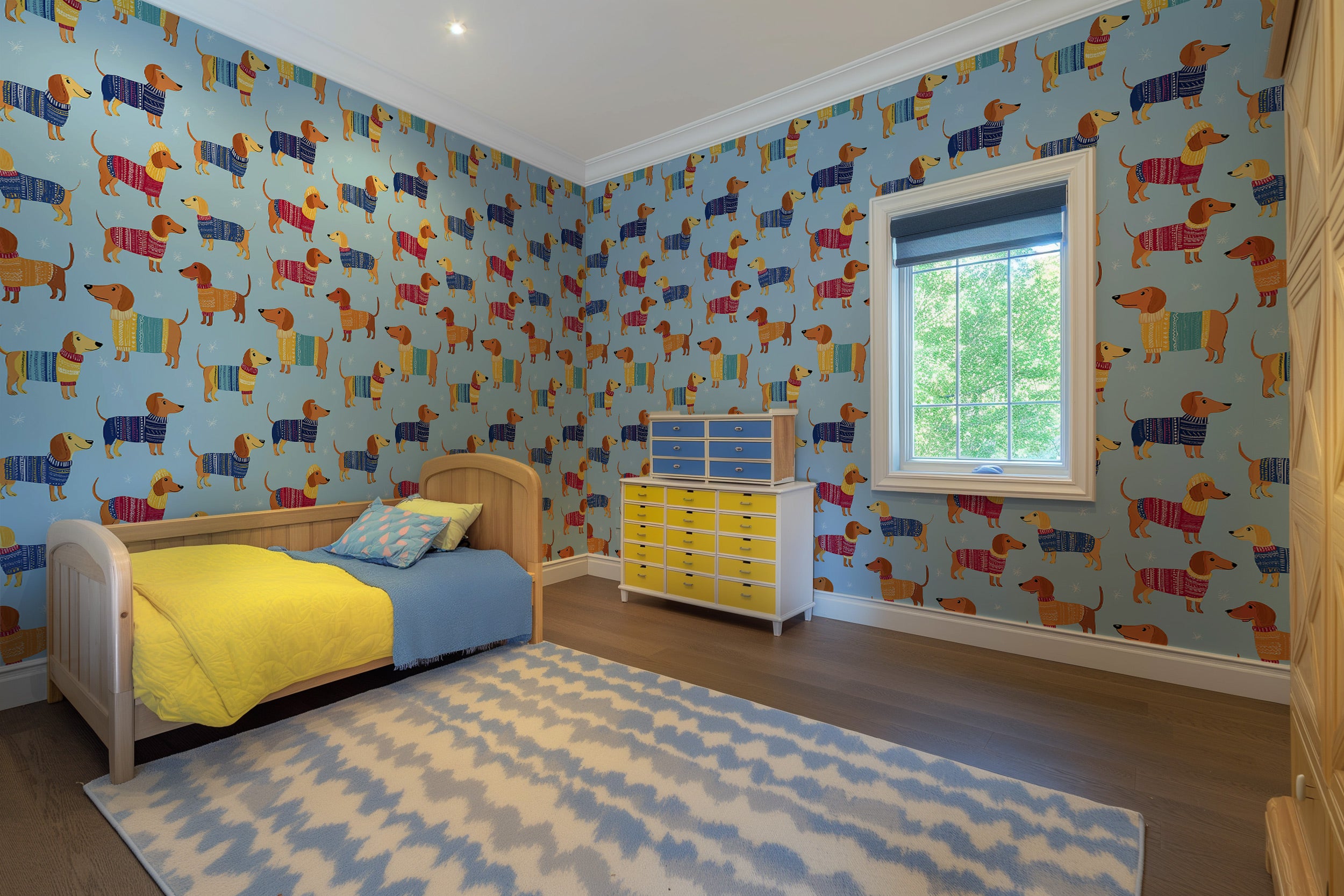 Cozy dachshund Christmas wallpaper in a blue room with playful wiener dogs in colorful sweaters on a pale blue backdrop, kids