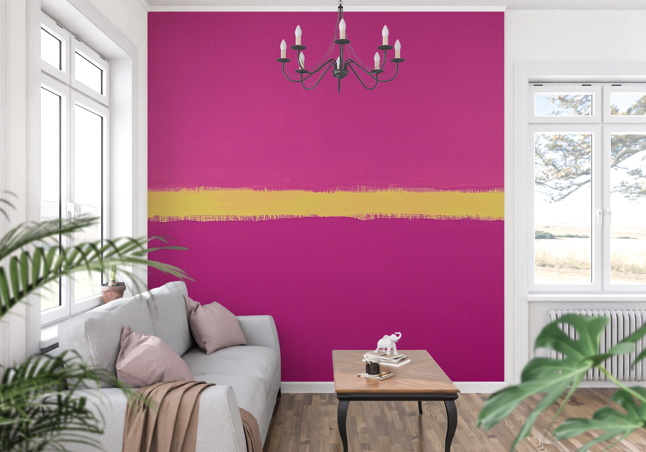 Bold magenta pink abstract peel and stick mural with a gold brushstroke stripe in a bright living room setting