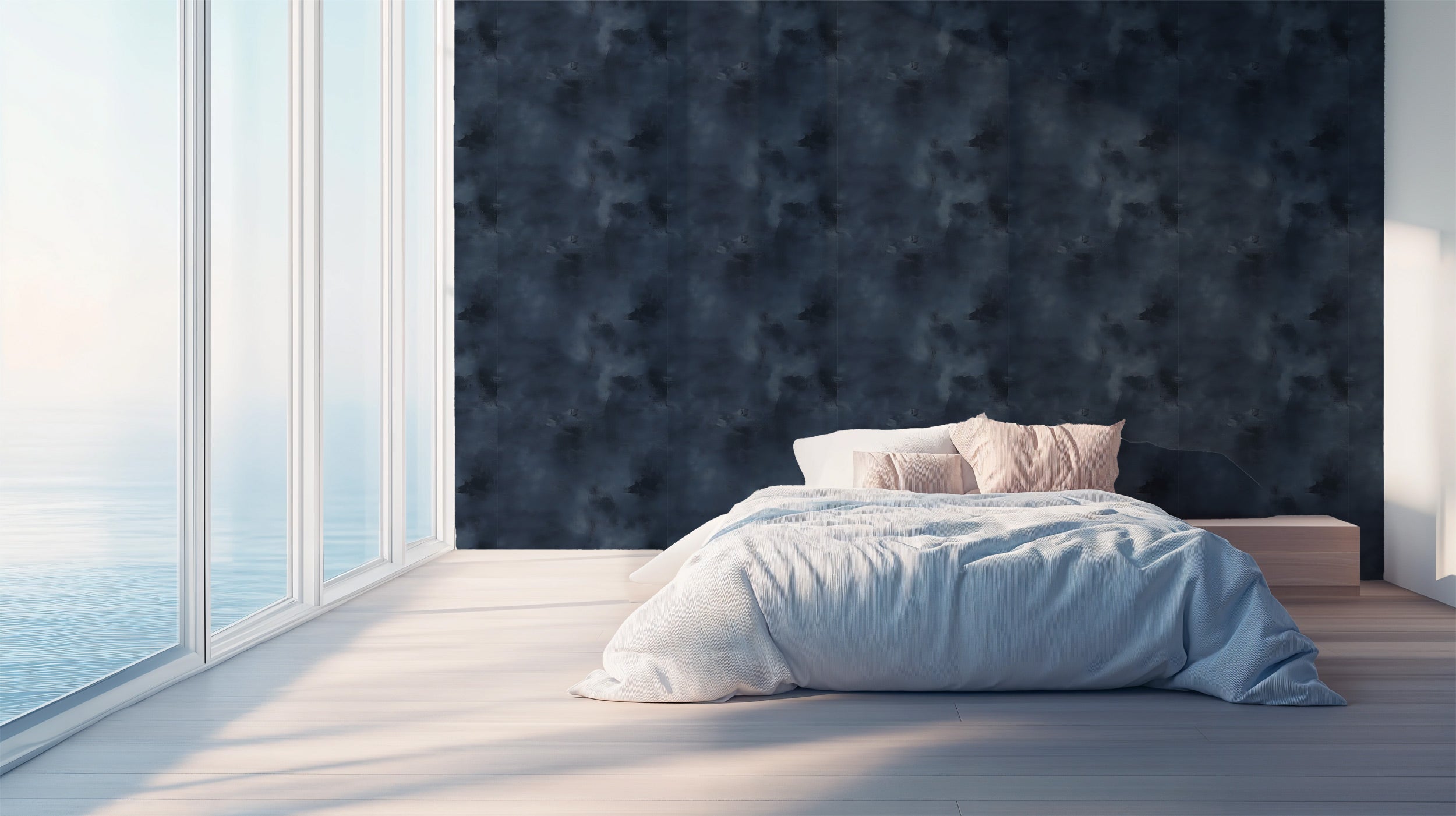 Navy blue abstract texture wallpaper in a modern bedroom with a low bed and light wooden floor by large windows