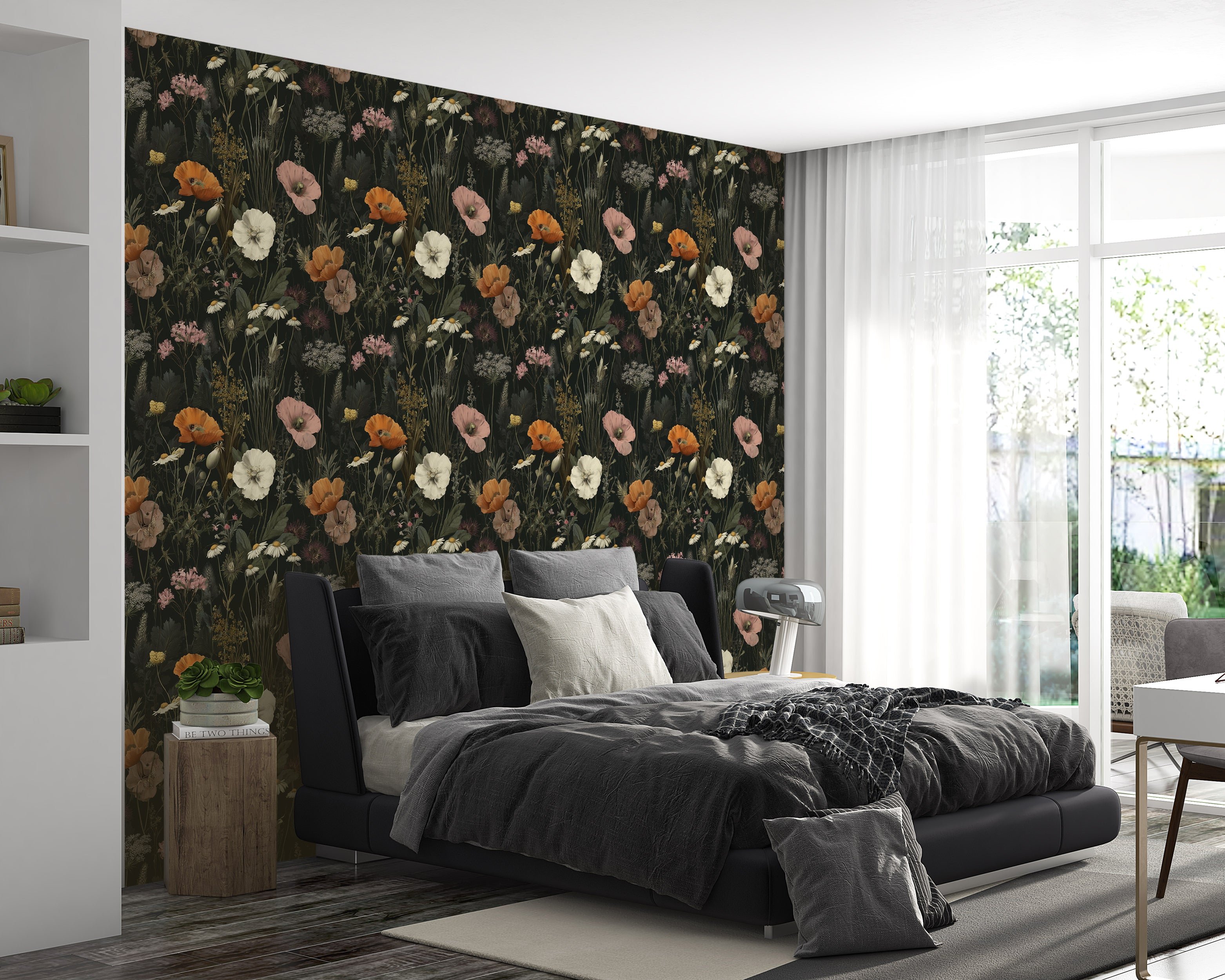 Dark botanical floral wallpaper with poppies and wildflowers on a moody black backdrop in a modern bedroom with a low black b