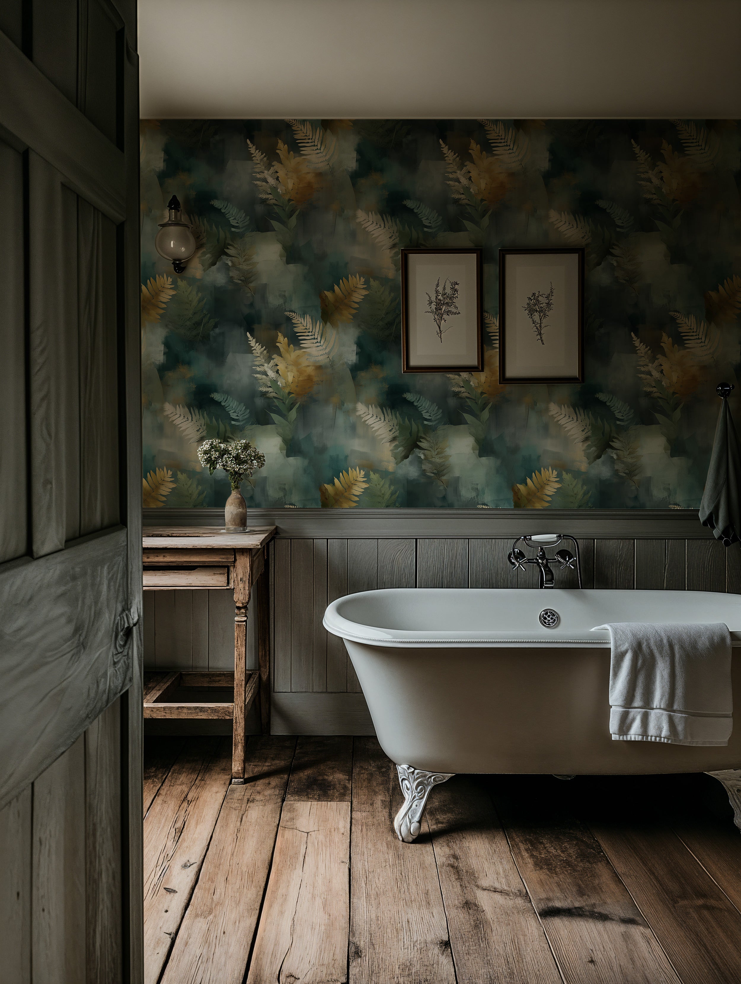 Abstract botanical wallpaper with golden ferns on teal background in a vintage bathroom with a freestanding bathtub and woode