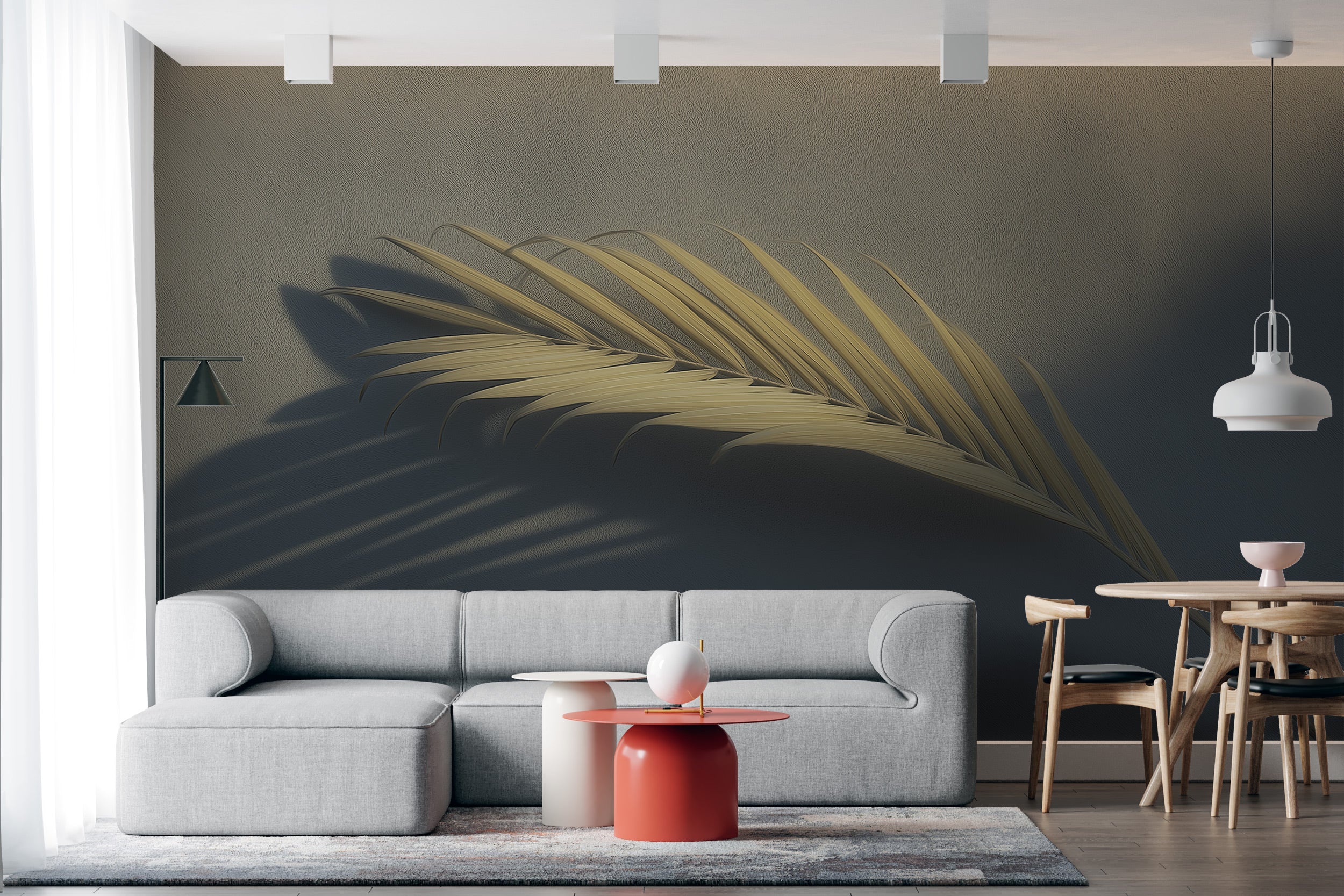 Golden palm leaf mural wallpaper in a modern living room with a neutral beige-gray background and dramatic shadows over a lig