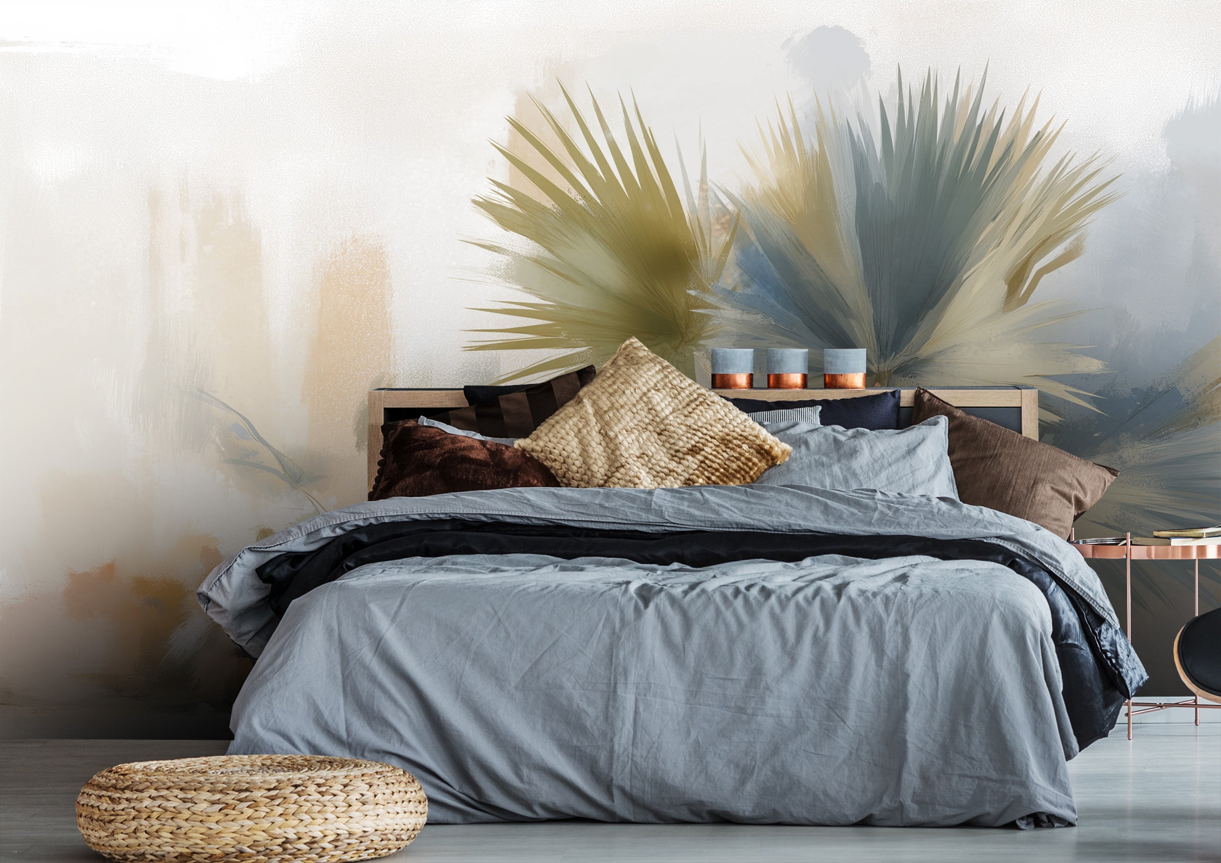 Watercolor palm tree mural behind a modern bed with blue-gray bedding, beige and green tropical backdrop in a cozy neutral be