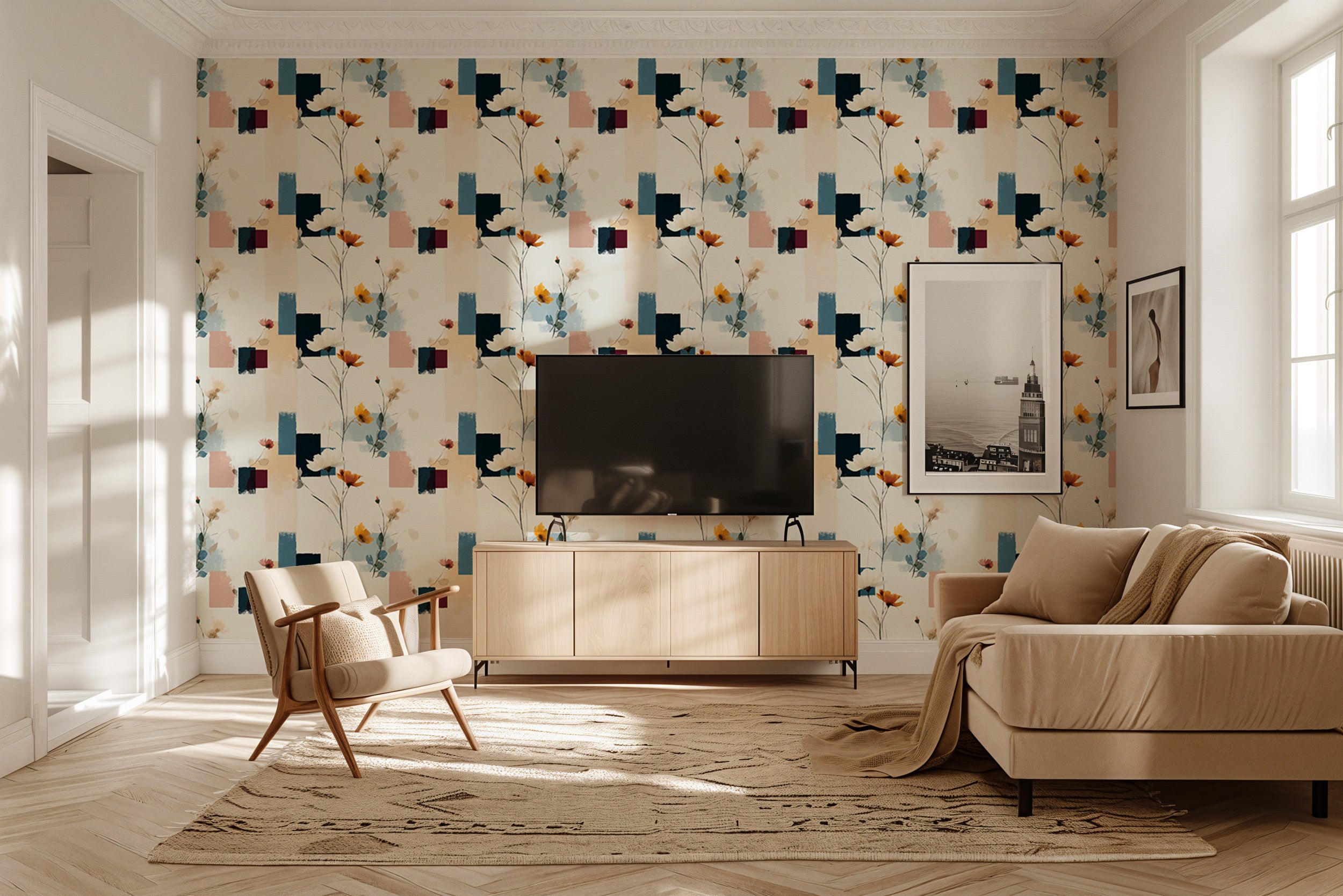 Abstract floral wallpaper with geometric shapes in navy teal coral and peach, living room setting with TV, beige sofa and art