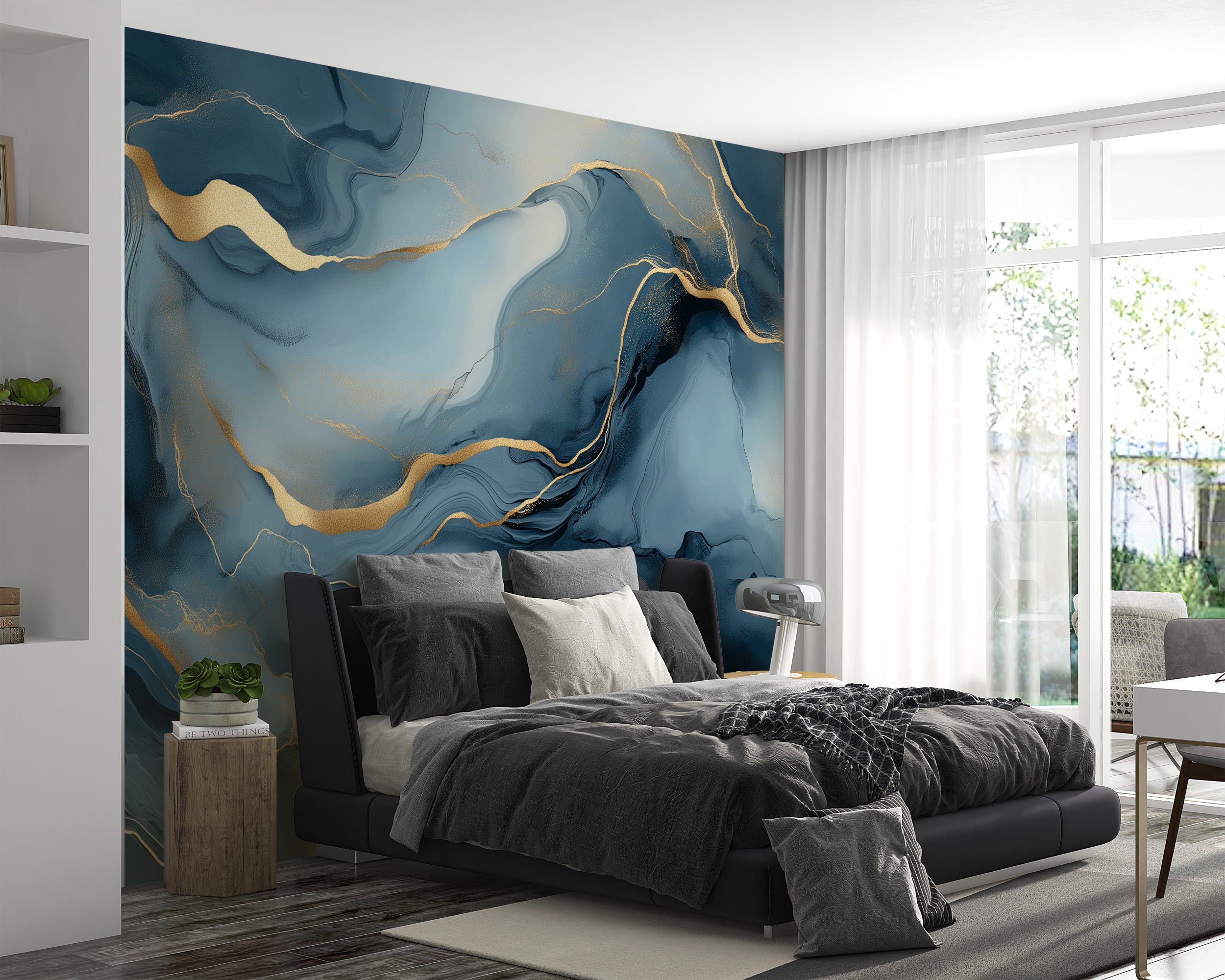 Blue abstract marble mural with gold veining on a bedroom accent wall in a modern dark bed setup with sheer curtains and neut