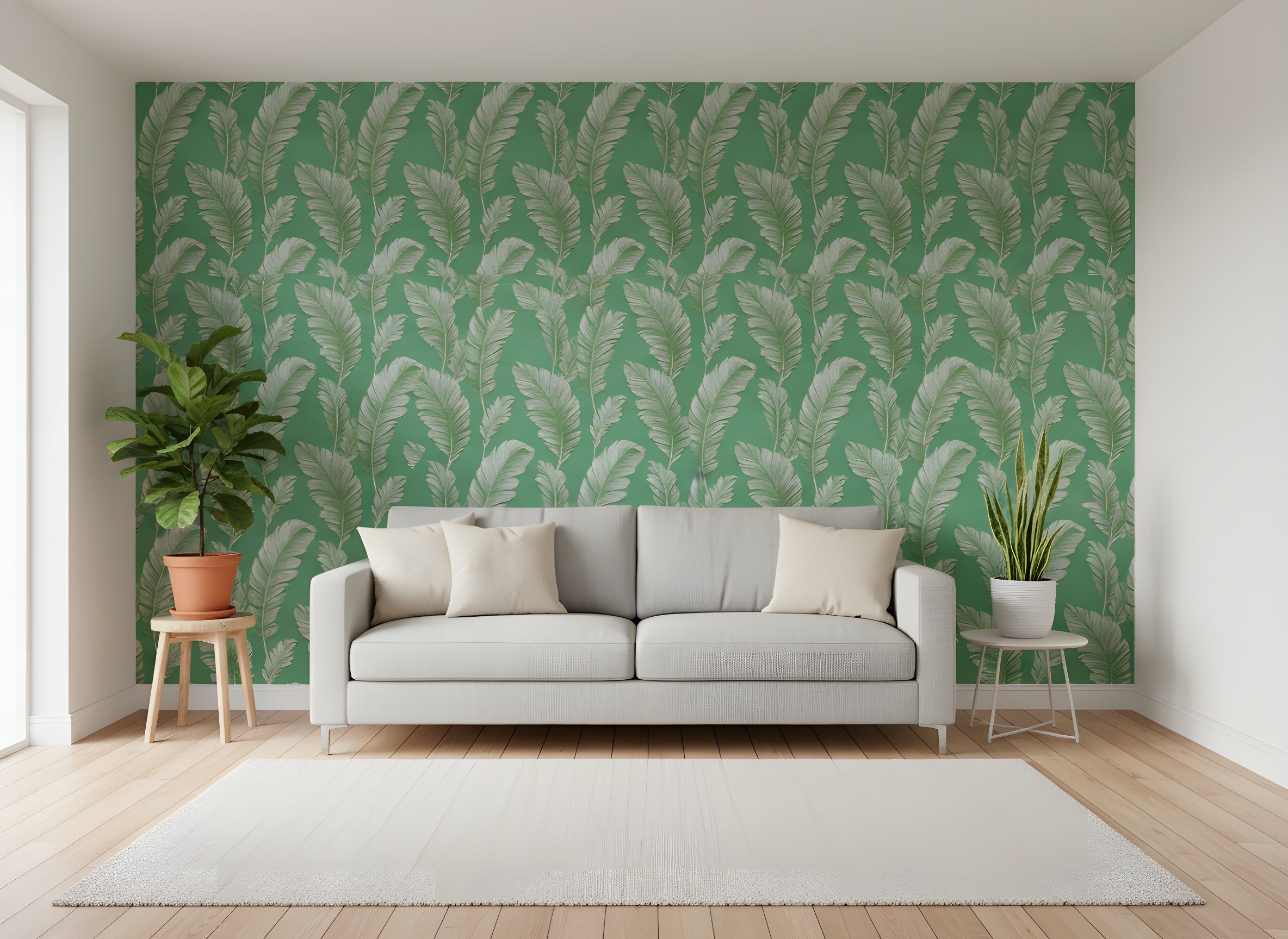 Green palm leaves wallpaper with cream and white fronds on emerald green background shown in a stylish living room with a light gray sofa, neutral