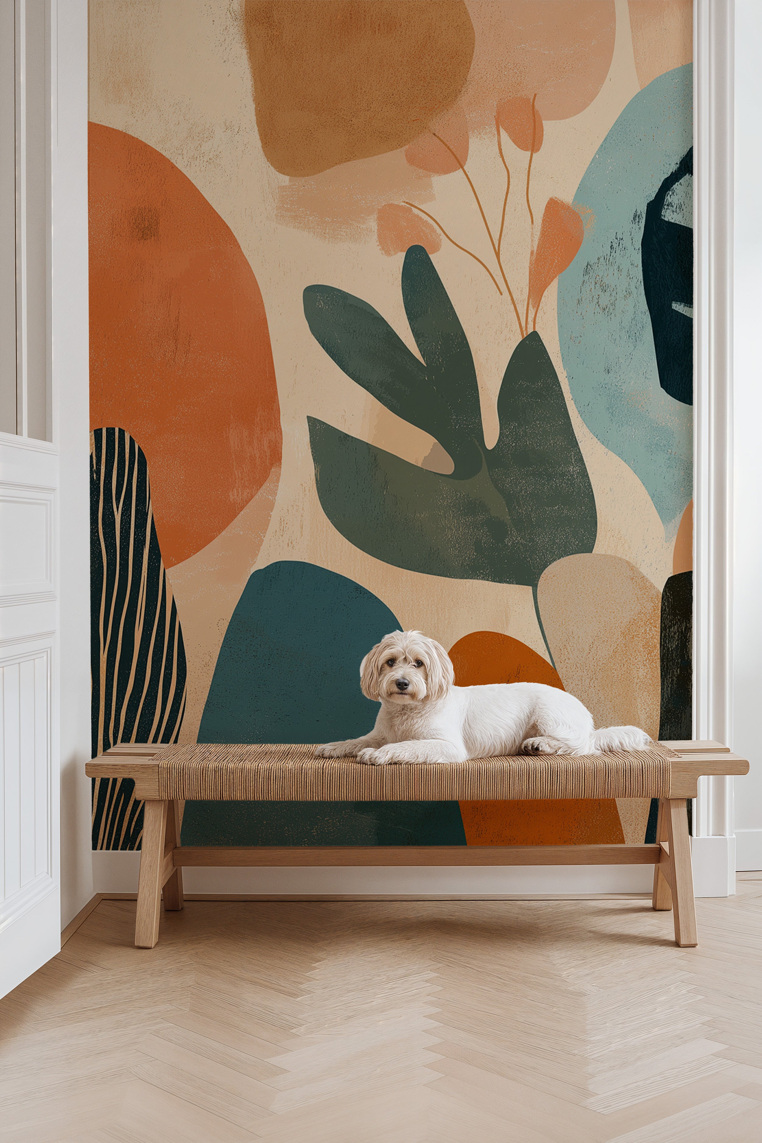 Abstract botanical mural with terracotta teal beige tones featuring tropical leaves, painterly textures, shown behind a dog o
