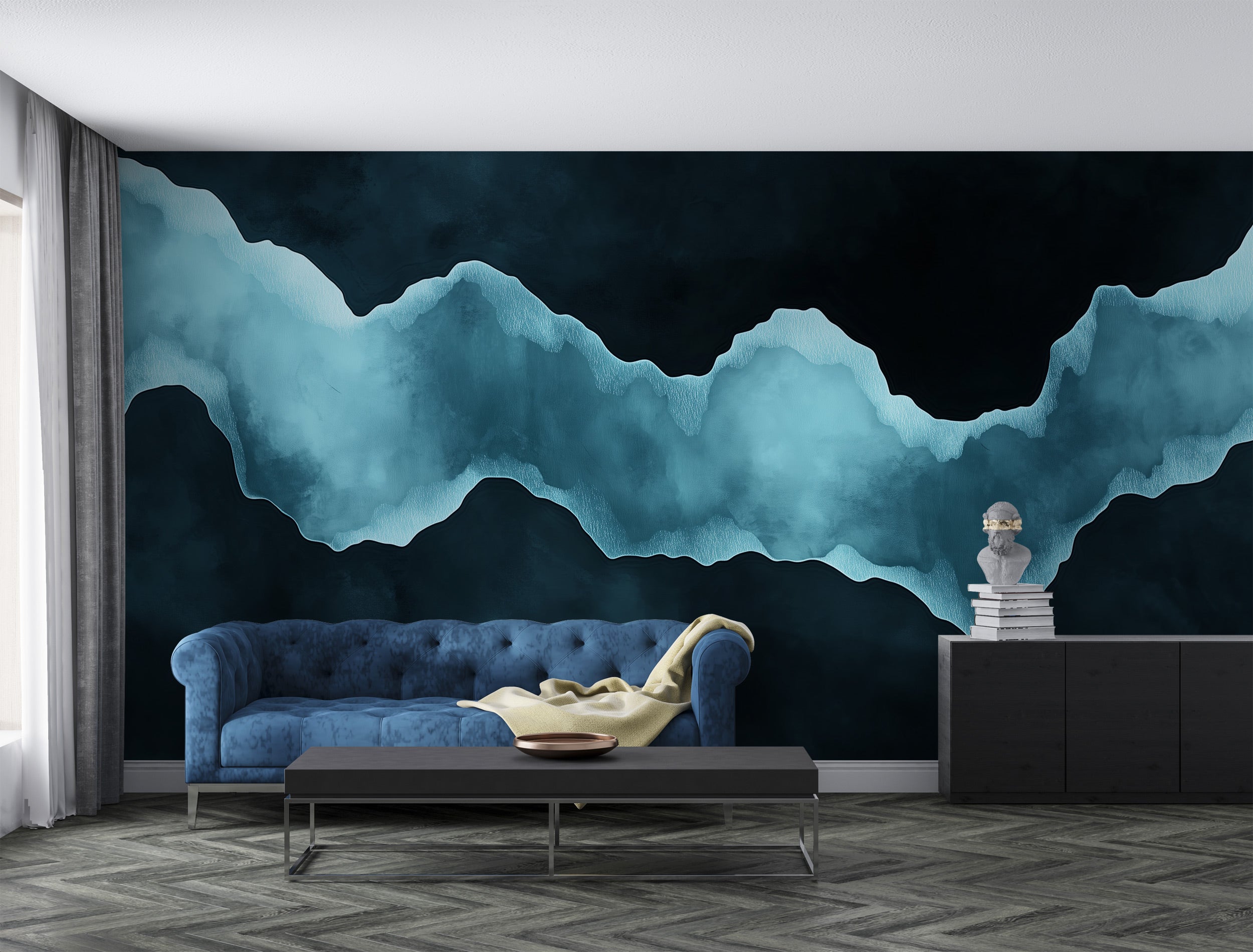 Abstract teal mountain wall mural in a modern living room with navy teal tones, plush blue sofa and minimalist furniture