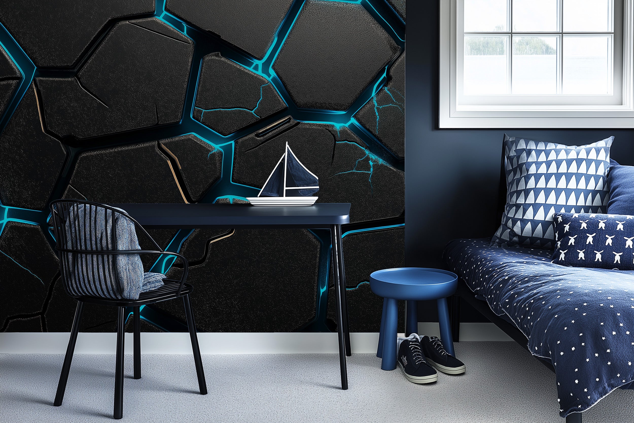 Futuristic hexagon mural with dark panels and cyan glowing lines in a modern blue gaming nook with desk, chair, and cushions