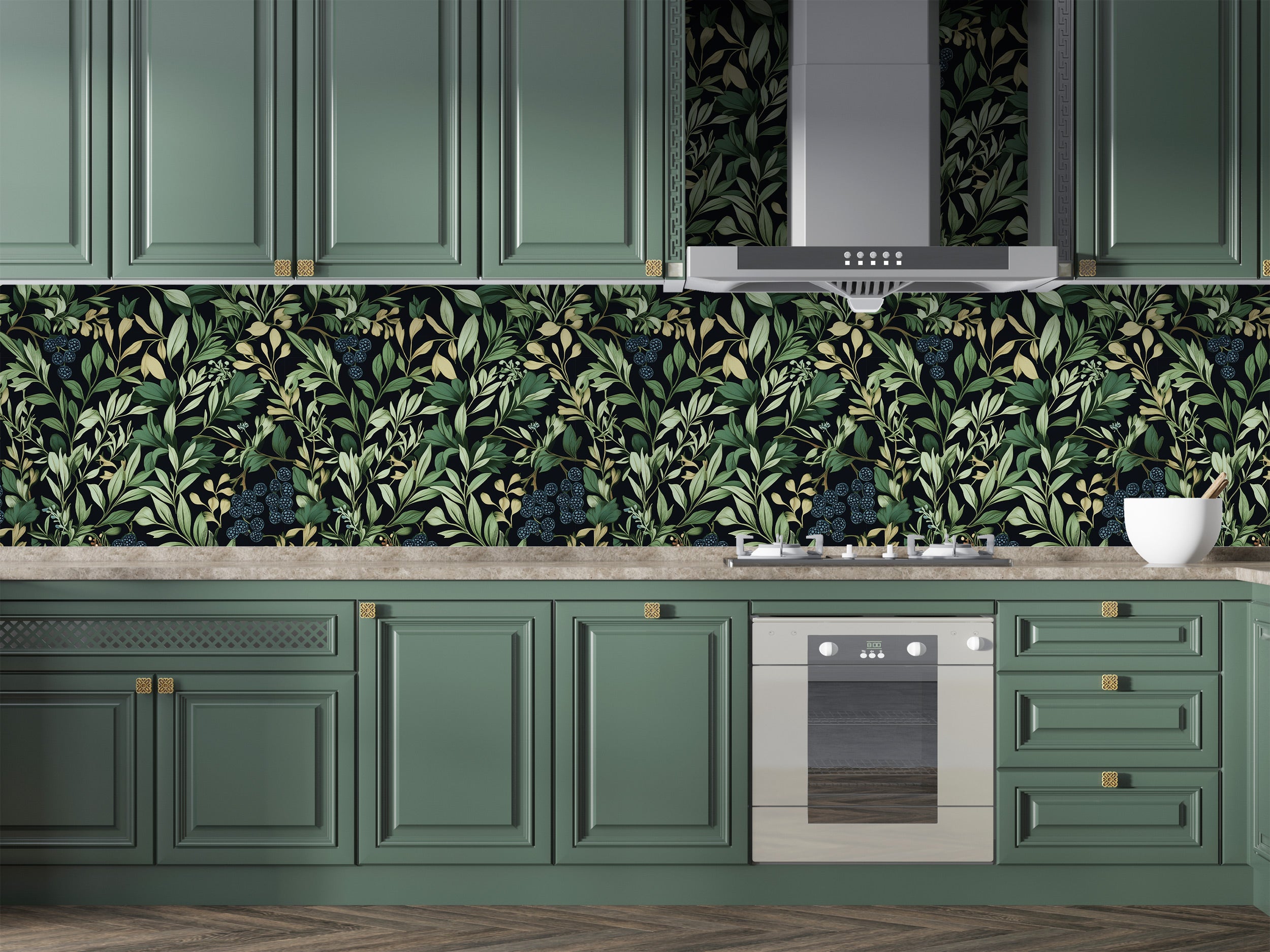 Dark botanical berry wallpaper with green leaves and blue berries on a moody dark background in a green kitchen with drawers