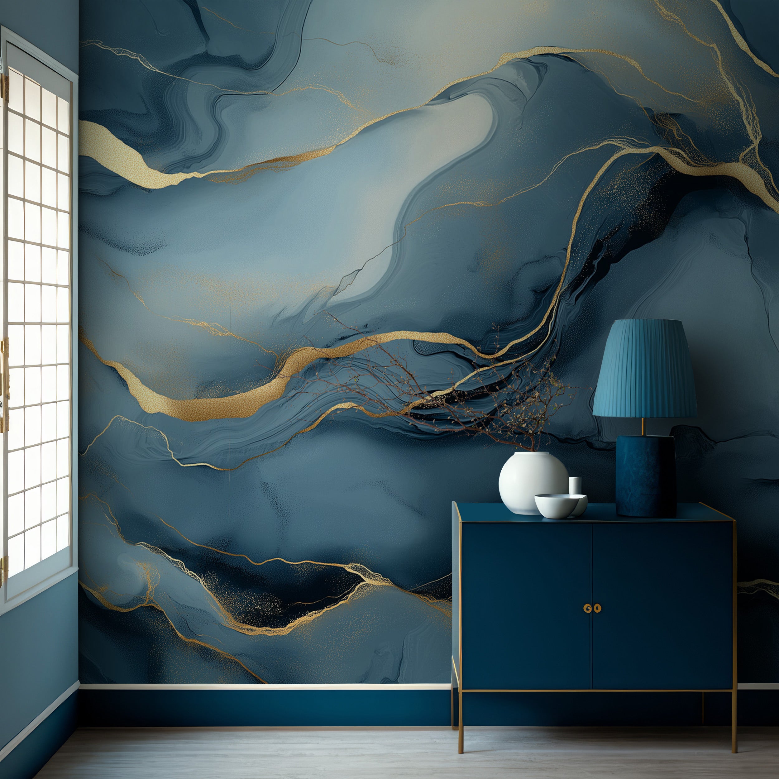 Blue abstract marble mural with gold veining in a navy room featuring a matching blue sideboard and teal lamp, modern self-ad